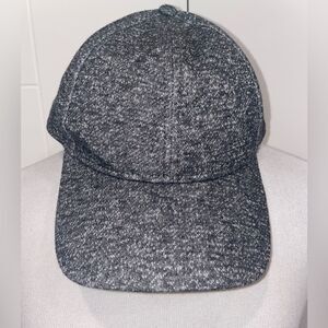 Used charcoal gray speckled baseball hat